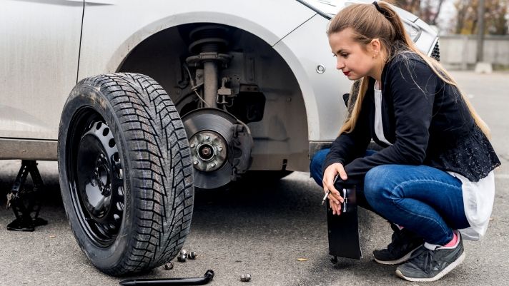 What to Do After Changing a Tire